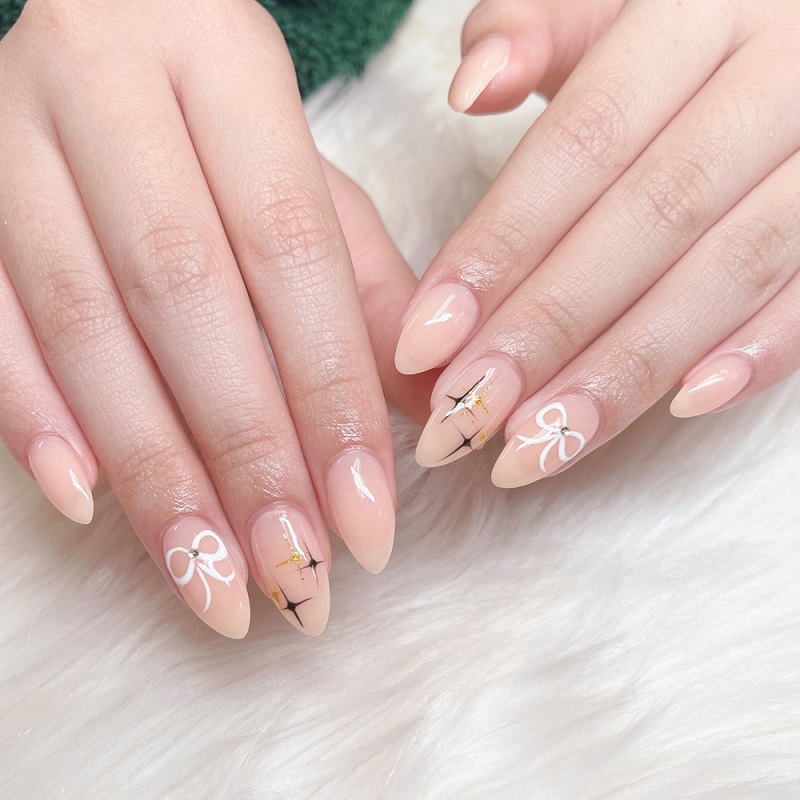 model de unghii cu funda pictata