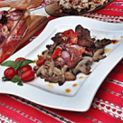 Ficatei aromati cu busuioc, cu rosii Cherry, pe pat de ciuperci