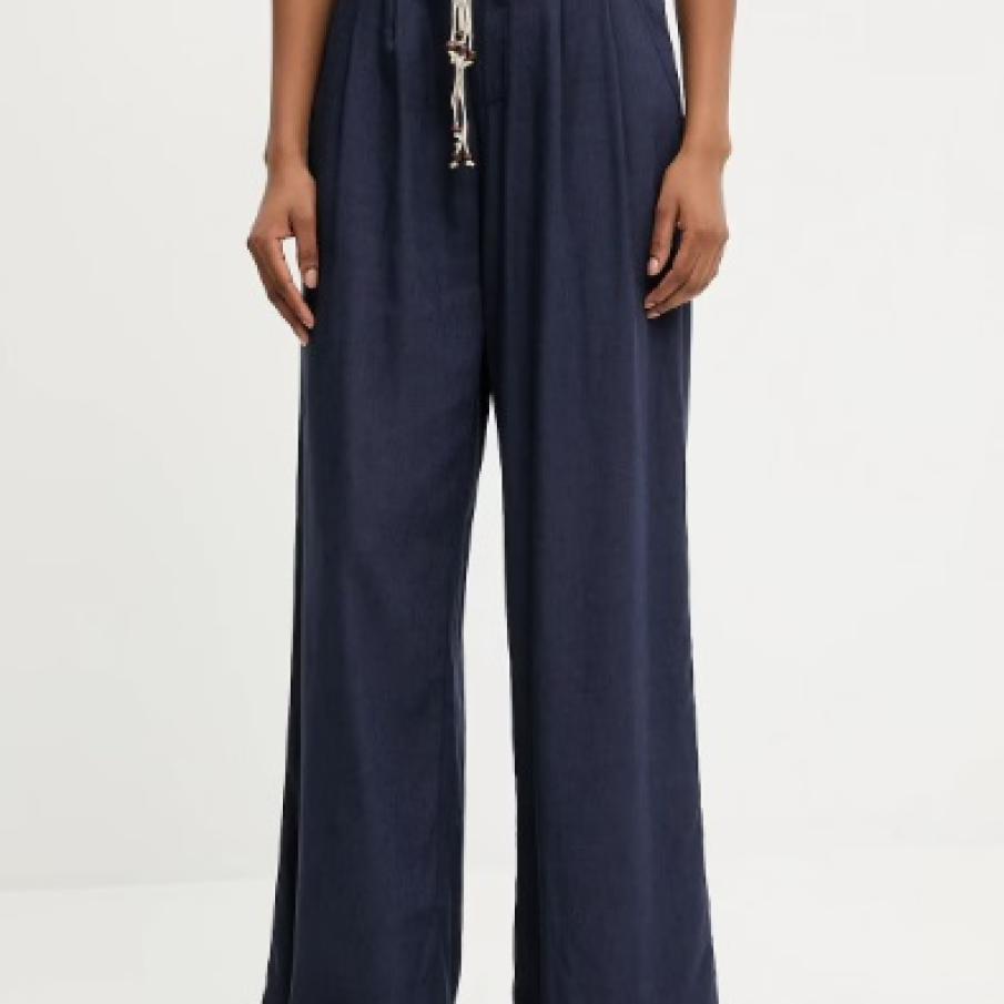 Pantalonii în tendințe în vara 2025 sunt cei care atrag atenția asupra taliei și o structurează cu stil