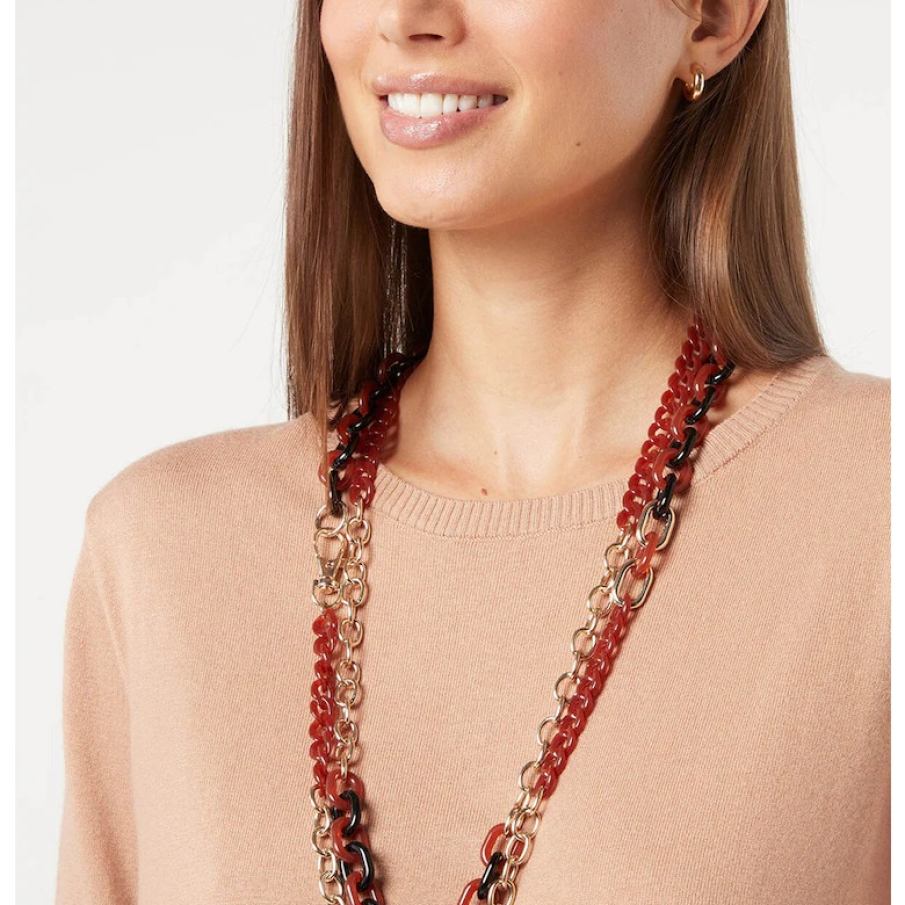Colier cu două șiraguri suprapuse unul peste celălalt, de efect, ce combină vizual metalul auriu cu acrilul roșu și negru