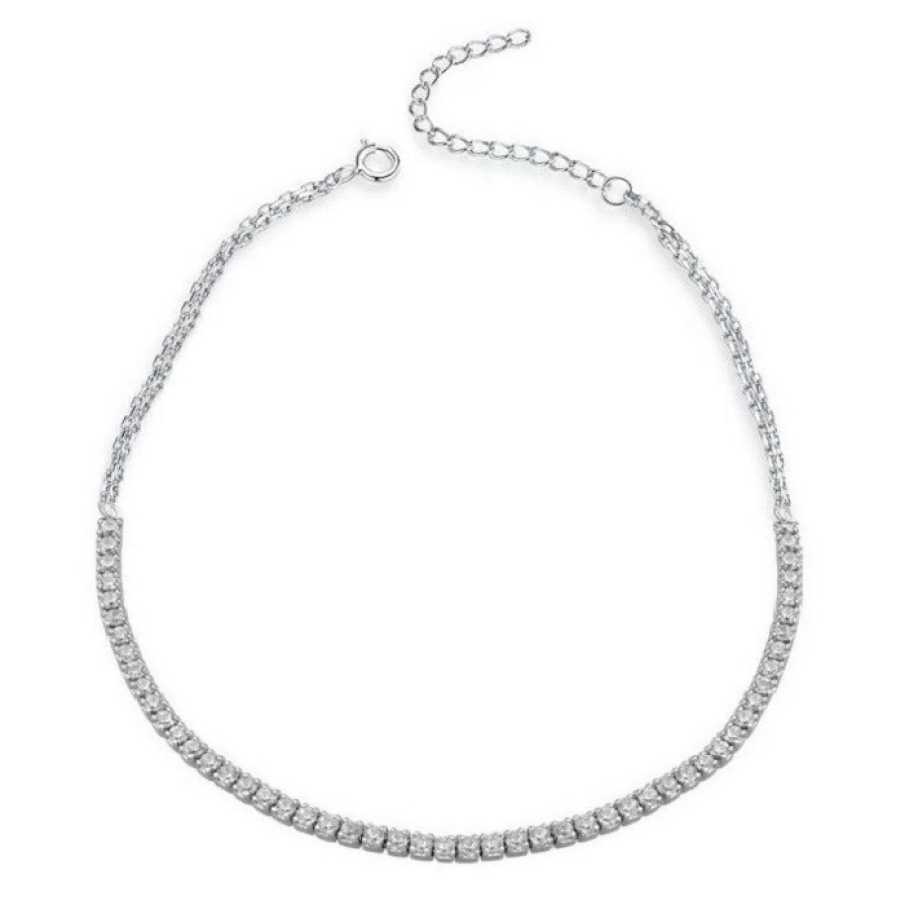 O brățară de picior model TENNIS, sofisticată și deosebită. Este împodobită cu cristale albe cubic zirconia de înaltă calitate.