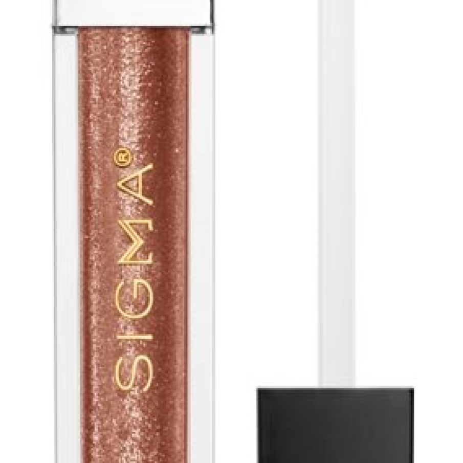 Luciu de buze cu sclipici by Sigma Beauty într-o nuanță ciocolatie Dazzling. Conferă strălucire, hidratare și catifelare buzelor.