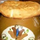 Reteta boiereasca: pui sub capac de paine 