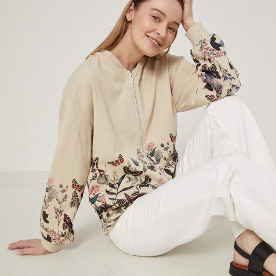 Hanorac de bumbac bej, cu imprimeu inspirat de natură în partea inferioară a bluzei