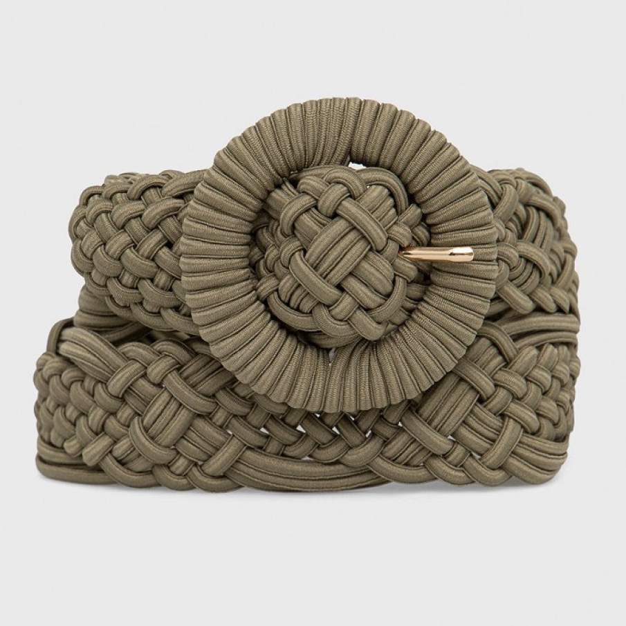 Curea verde închis din material țesut. Cureaua face parte din colecția Pieces.