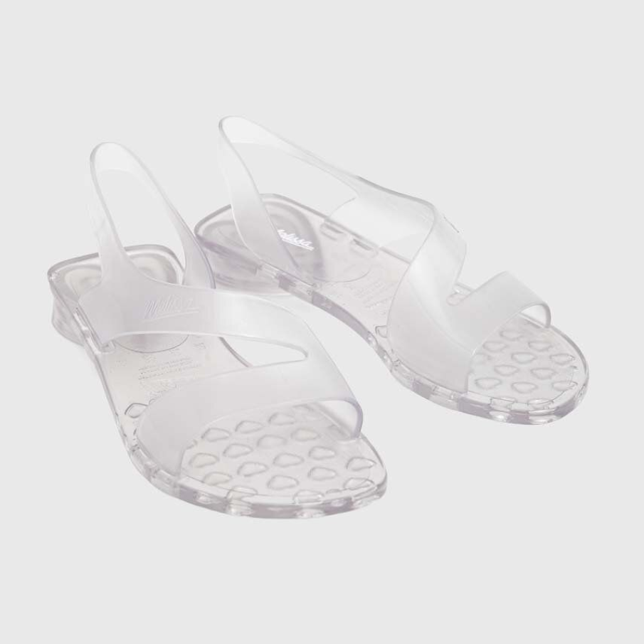 Sandale transparente Melissa confecționate din masă plastică unică, confecționată din amestec de plastic și cauciuc cu miros caracteristic de gumă de mestecat
