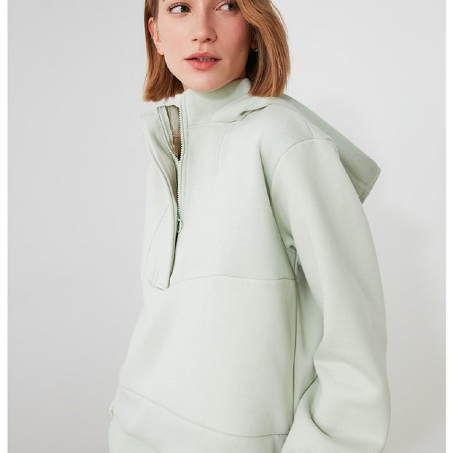 Hanorac supradimensionat uni, în nuanță de verde mentă, confecționat cu fentă și cu fermoar