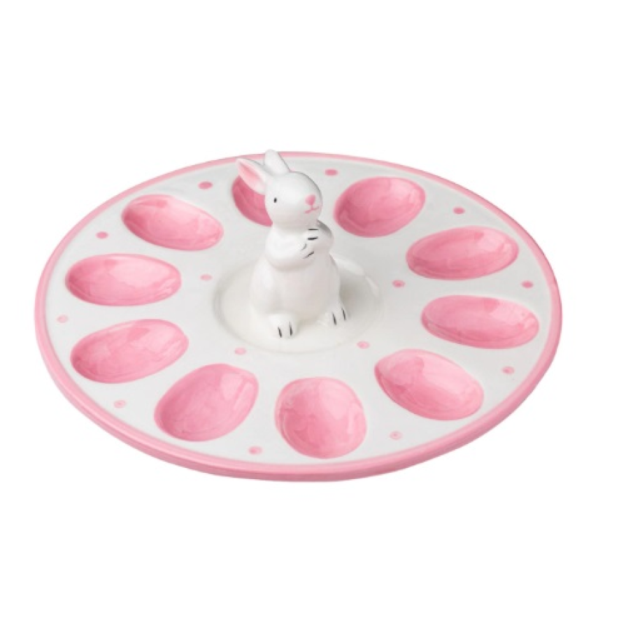 Primăvara se așază cu voi la masă odată cu acest platou-suport pentru ouăle de Paști. Figurina din ceramică albă și roz susține 10 ouă. 