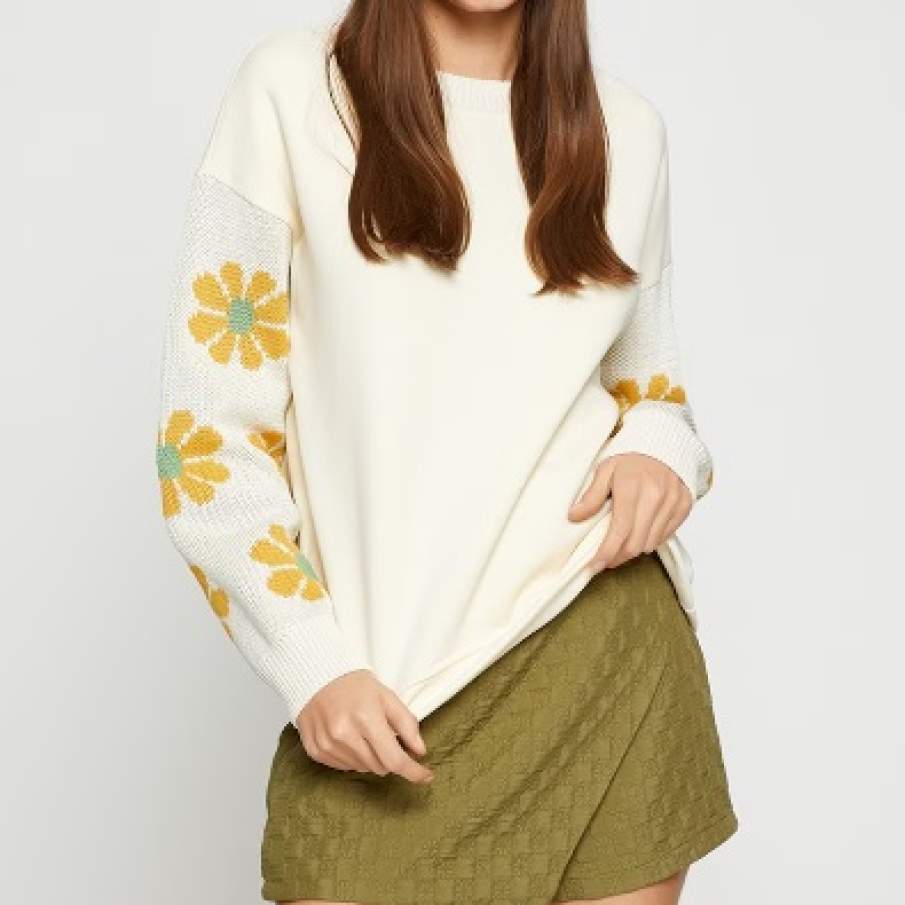 Bluză sport KOTON în nuanță de alb fildeș, cu imprimeu floral dispus de-a lungul mânecilor 