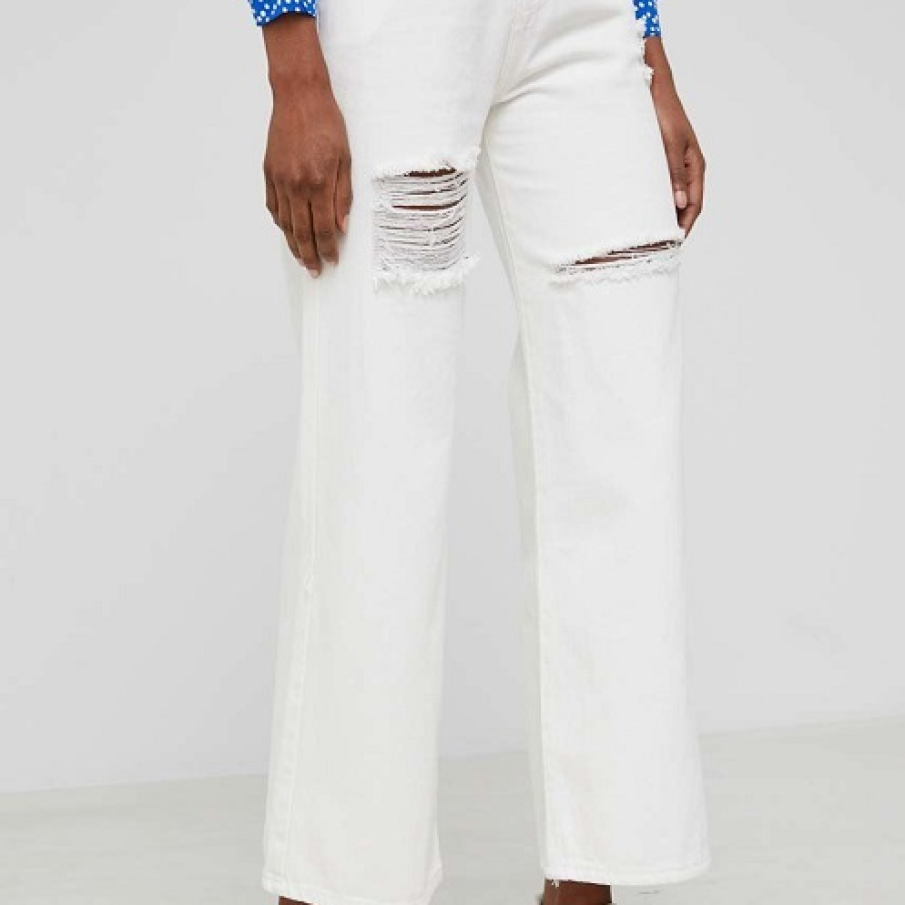 Blugi cu talie înaltă din denim ceruit, design cu picior lat și abraziuni decorative 