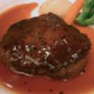 Cotlet de porc umplut in sos de vin rosu 