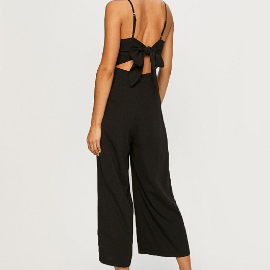 Salopetă neagră cu fundă și decupaje pe spate 