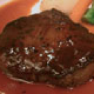 Pulpa de mistret impanata si sos de ciuperci si vin