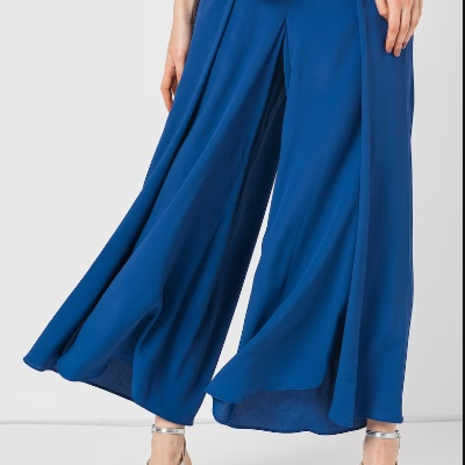 Pantaloni ampli Marella în nuanță de albastru roial, confecționați din amestec de mătase. Au șlituri laterale și sunt perfecți pentru zilele călduroase de vară