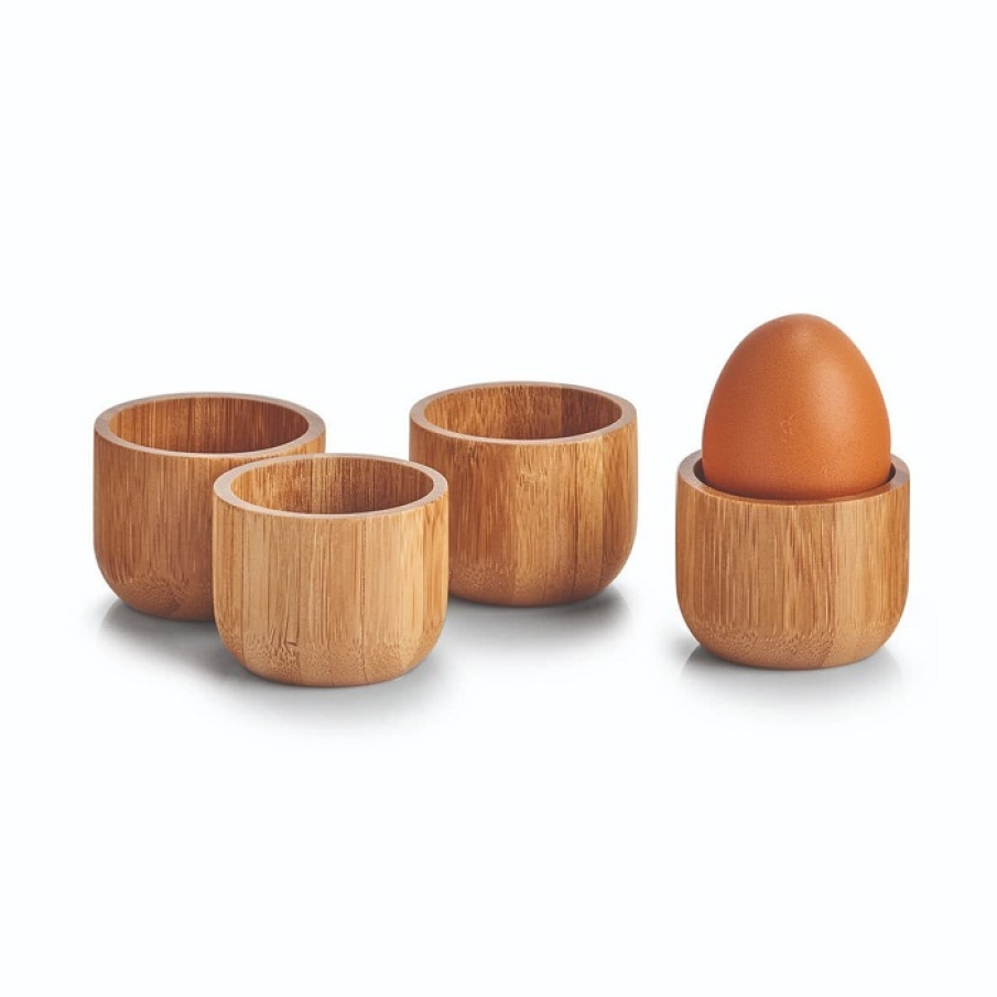 Set suport de ouă din patru piese, confecționate dintr-un material natural - lemnul de bambus. Au un aspect elegant, deosebit. 