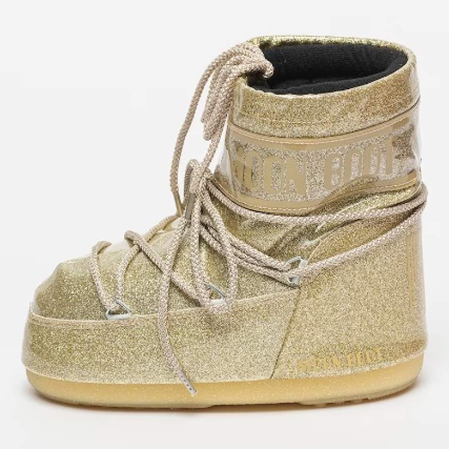 Cizme cu aspect metalizat Moon Boot din material auriu sintetic 