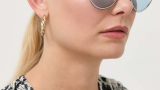 Ochelari de soare din colecția Guess ccu lentile netede, aspect cool și rame din combinație de plastic și metal